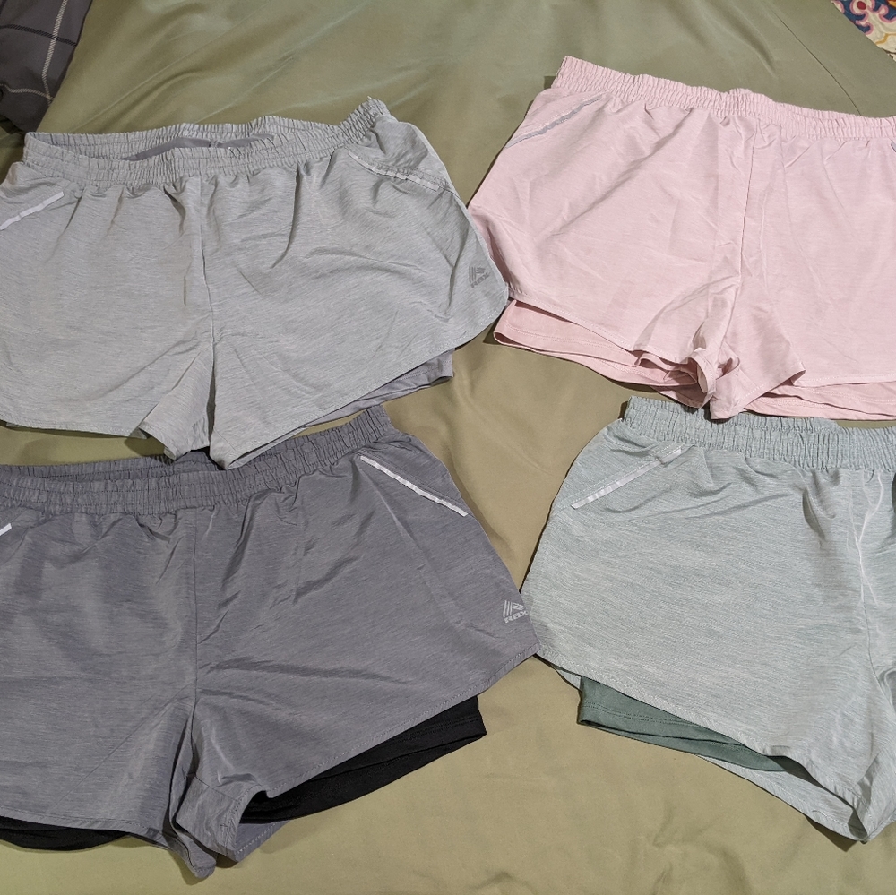 4 pair of RBX shorts. 3 NEVER WORN.